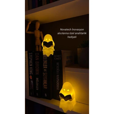Novatech İnovasyon Kitap Okuyan Hayalet Figürü 2’li Pilli Mum ile Kullanım Masaüstü Obje Dekoratif